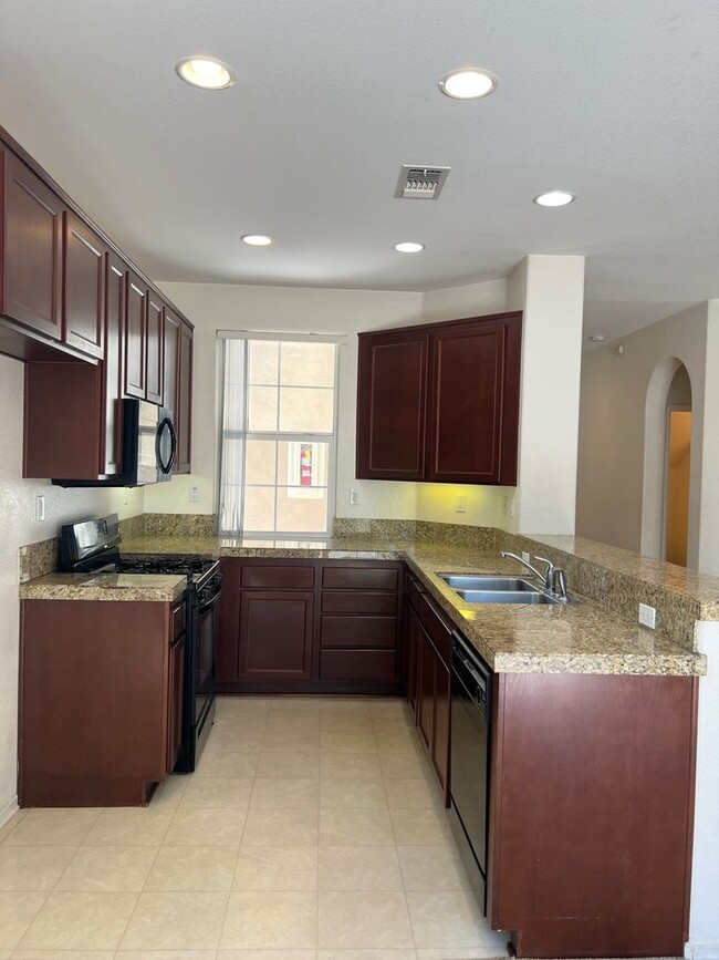 Building Photo - Wonderful Eastlake Townhome, 3 bedroom, 2.5 bath home, 2 car garage!