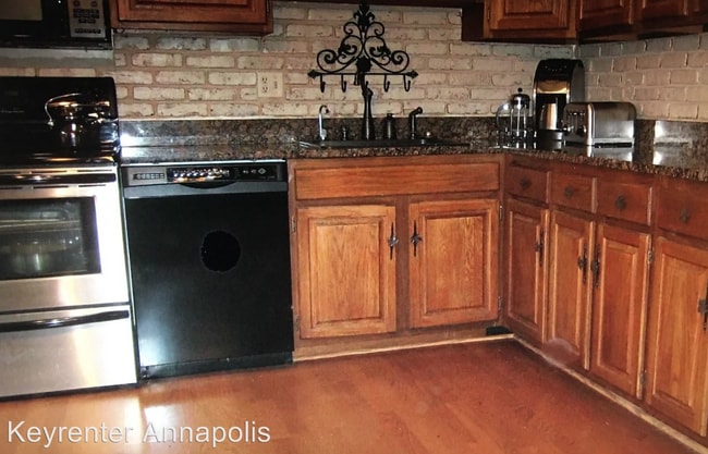 Kitchen with newer appliances, granite. - 1385 Stonecreek Rd
