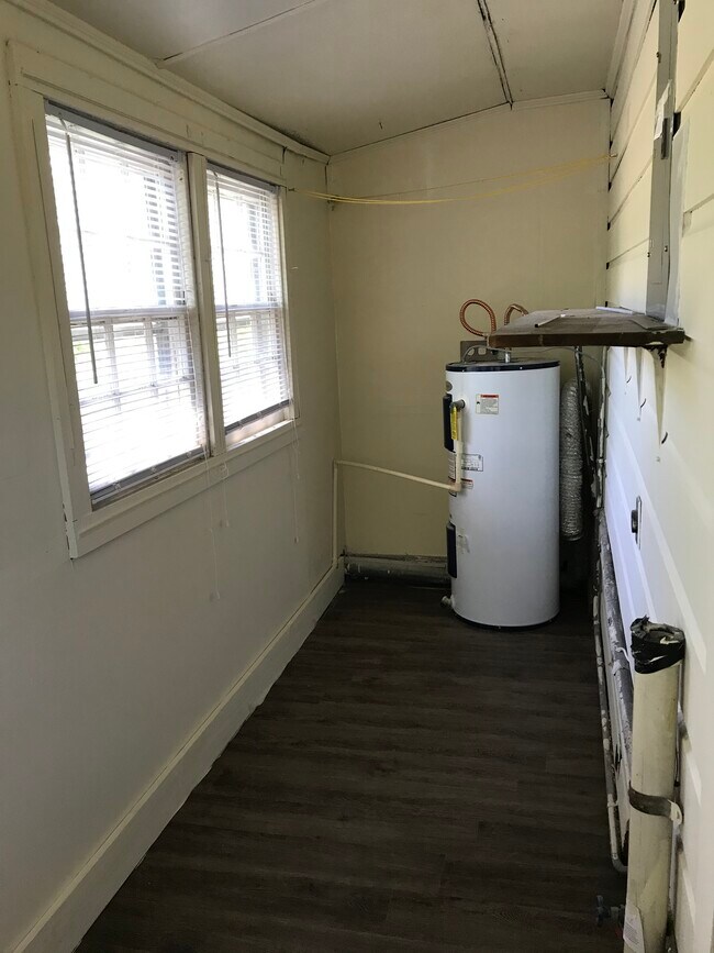 Laundry room. Washer/dryer hookup - 225 Sample Rd