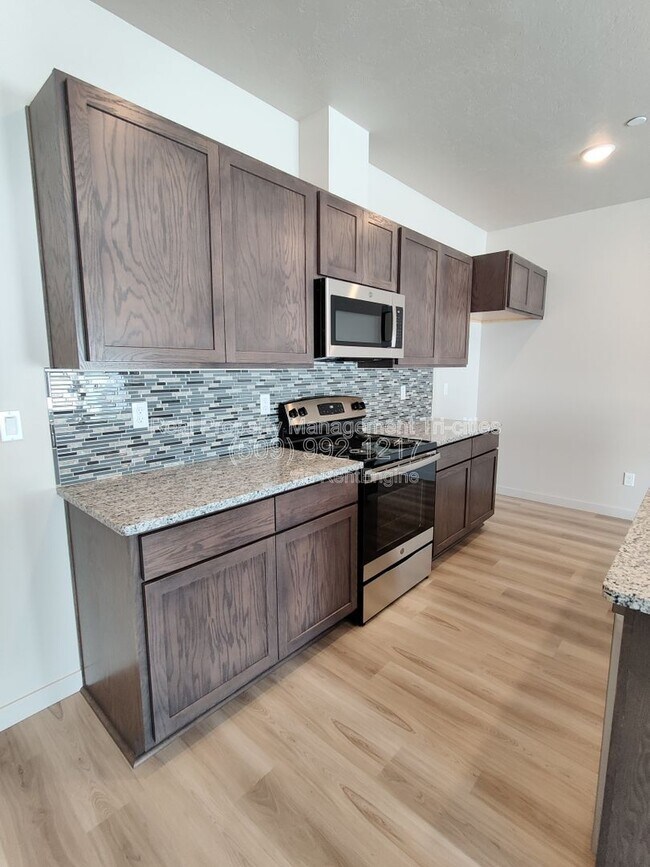 Foto del edificio - 3918 W 5th Pl