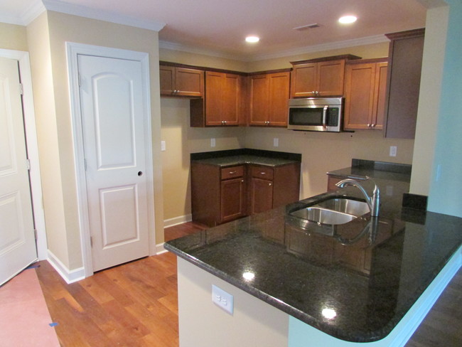 Granite tops with Ceramic Tile floor - 147 Oxford Dr