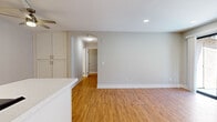 Step into a world of possibility in this beautifully reimagined 780 sq ft haven. The heart of this home is a masterfully crafted open-concept kitchen and living area, where sleek white cabinetry, stainless steel appliances, and warm wood floors create a harmonious atmosphere perfect for both relaxation and entertainment. The primary bedroom, a generous 160 sq ft retreat, beckons with its serene ambiance and modern ceiling fan, promising restful nights and energized mornings.

Throughout the home, large windows invite an abundance of natural light, creating an airy and uplifting environment. The bathrooms showcase contemporary design with clean lines and bright finishes, offering a spa-like experience in the comfort of your own home. Step outside onto your private balcony, where you can bask in the California sunshine and enjoy views of the lush surroundings.

This thoughtfully designed space isn't just a home; it's a canvas for your aspirations. Whether you're a young professional seeking a stylish urban retreat or looking to downsize without compromising on quality, this property offers the perfect balance of form and function. Embrace the opportunity to live in a space that inspires and elevates your everyday life.