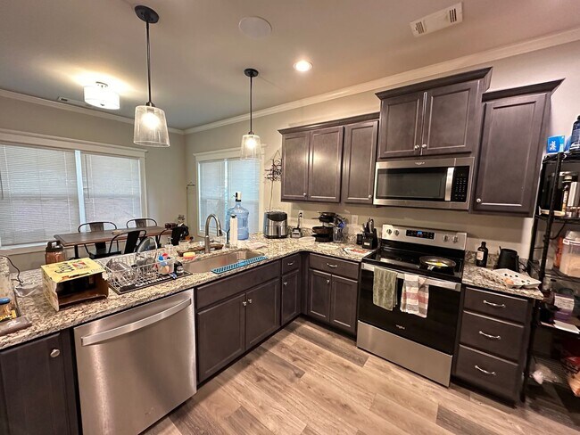 Building Photo - Four Bedroom Available for Pre-Lease