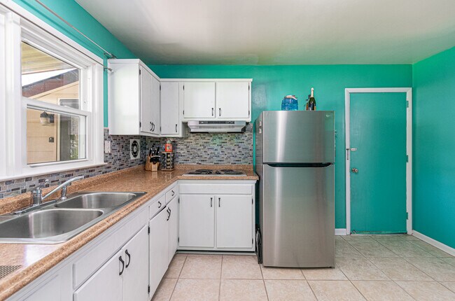 Building Photo - 3300 Woodsman Ln