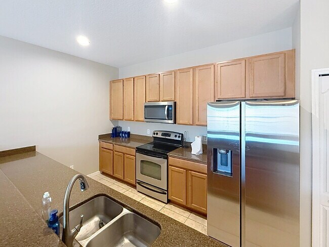 Building Photo - FURNISHED 4 bedroom townhome in Paradise Palms!