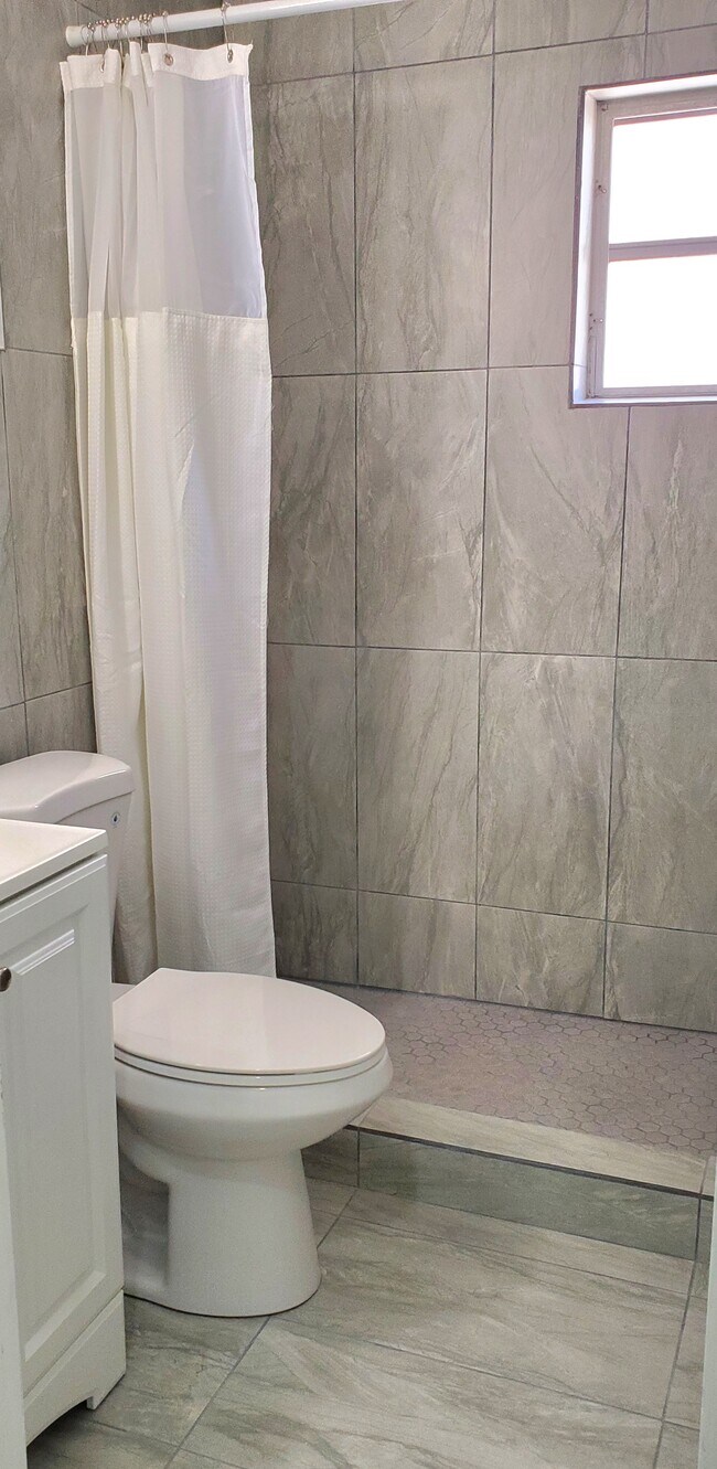 Remodelled Tile Bath - 703 124th Street Gulf