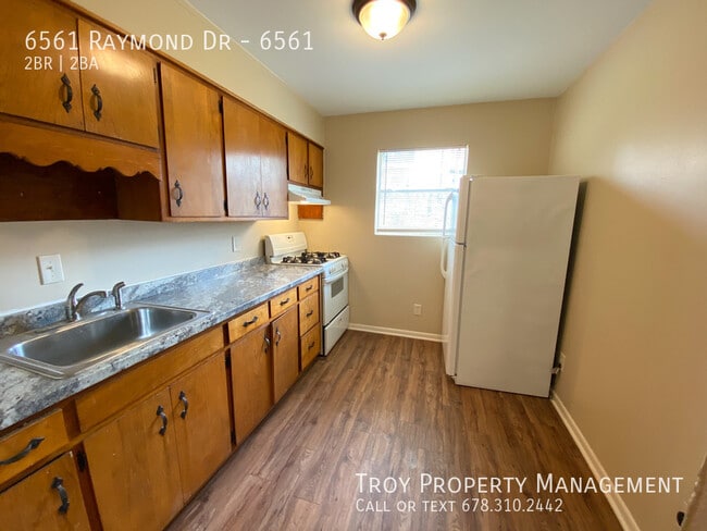 Building Photo - 6561 Raymond Dr