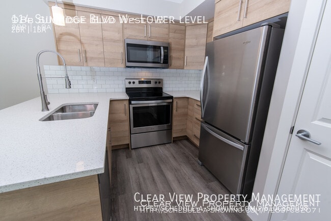 Building Photo - Amazing 2-bedroom, 1-bathroom suite with zero scaped yard!