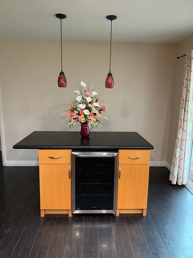 Island with wine cooler - 5651 Rudy Dr