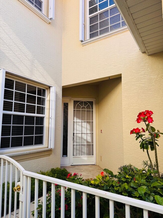 Building Photo - Experience Bell Tower Park. GATED ground floor 2 Bed 2 Bath Den 1 Car Garage Condo.