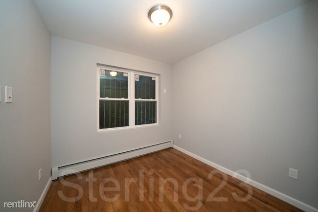 Building Photo - 49-17 21st Ave