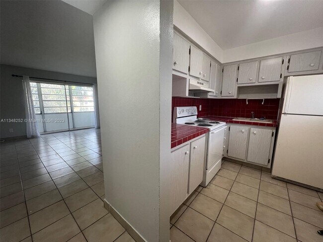 Building Photo - 20201 NE 29th Ct