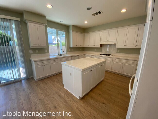 Building Photo - 4 br, 3 bath House - 44049 W. 47th St.