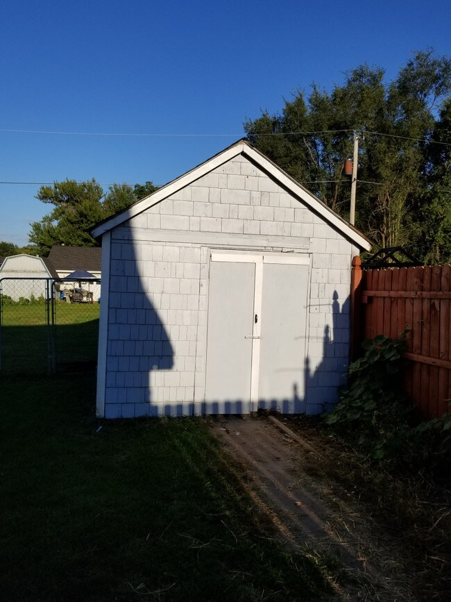 Building Photo - Gray House by Church