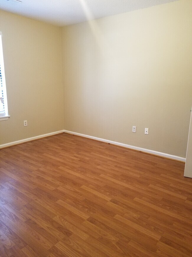 Building Photo - Three Bedroom Brick Home Walking Distance ...
