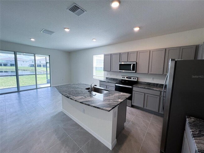 Building Photo - 1722 Woodleaf Hammock Ct