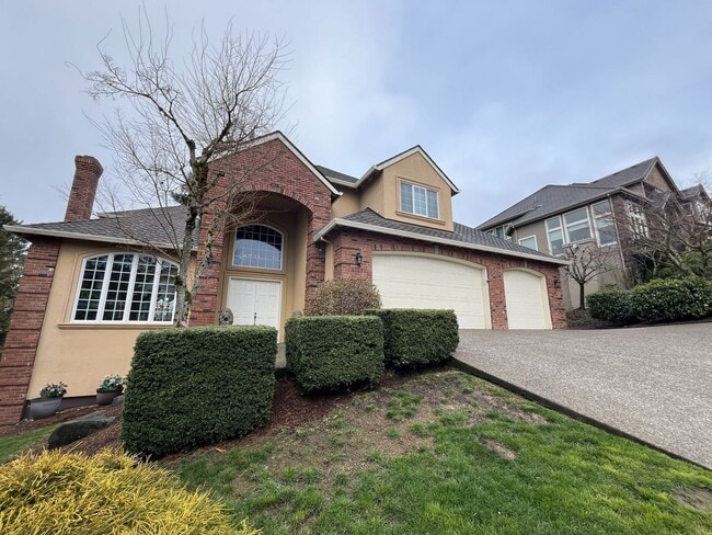 Building Photo - Executive-Style Northwest Heights Home with Forest Views and Refined Architectural Details