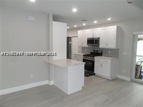 Building Photo - 6540 W 11th Ln