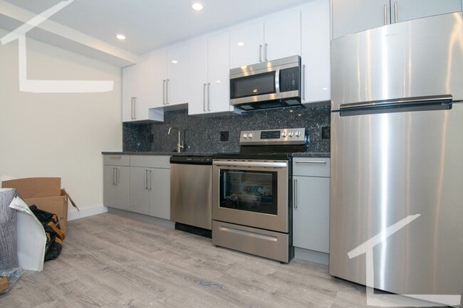 Photo - New Building, In-Unit Washer and Dryer, Central Heat/AC, Elevator, Parking for Rent Apartment