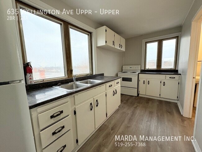 Building Photo - COZY 2 BED/1BATH UPPER UNIT -ALL INCLUSIVE