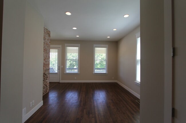 Building Photo - Midtown Renovated Duplex - Hardwood Floors, Exposed Brick