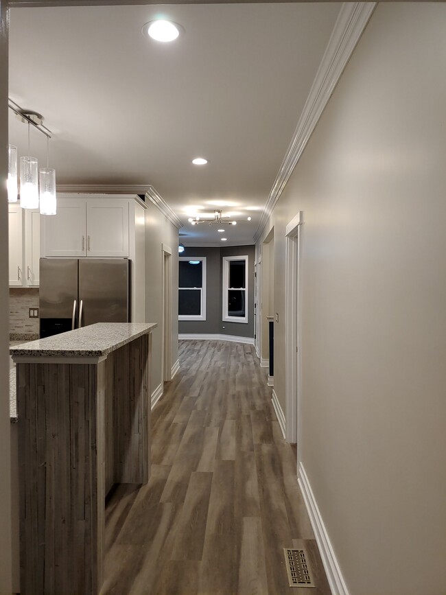 Hallway looking towards the front of the house. - 4937 N Bell Ave