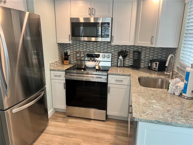 Building Photo - 6154 Midnight Pass Rd