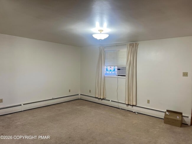 Building Photo - 144 E Diaz Ave