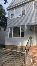 Building Photo - 42-21 65th Pl