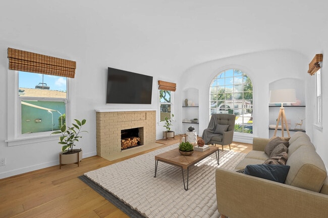 Bright and sunny living room (virtually staged) - 508 Winchester Ave