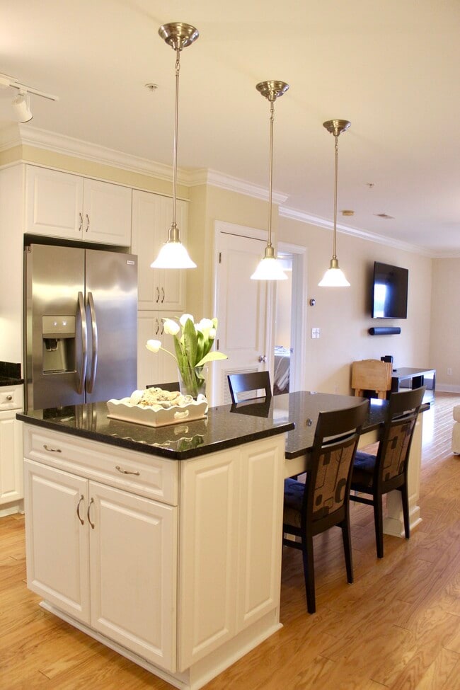 Photo - 6831 Main St Townhome