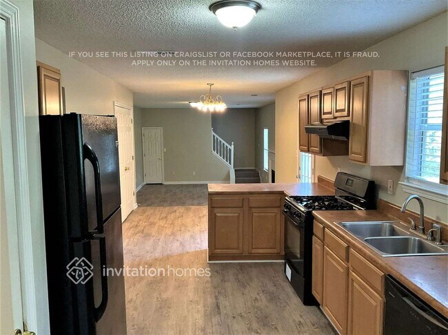 Foto del edificio - 3441 Riverview Chase Dr