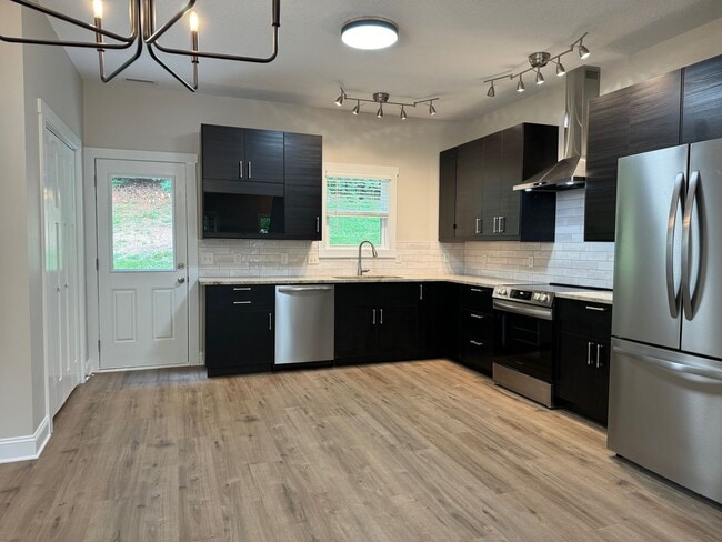 Building Photo - West AVL - Modern, 2-Bedroom Townhome