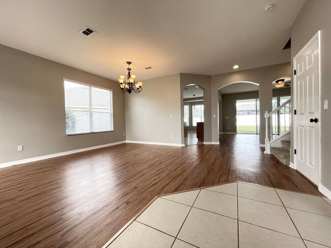 Building Photo - Gated 5 Bedroom Home with Large Fenced Bac...