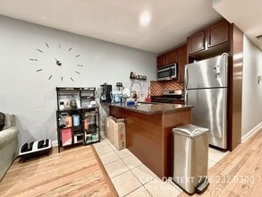 Building Photo - 5791 N Ridge Ave