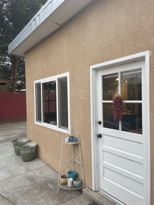 Front door with path to outside area - 1316 Arizona St NE