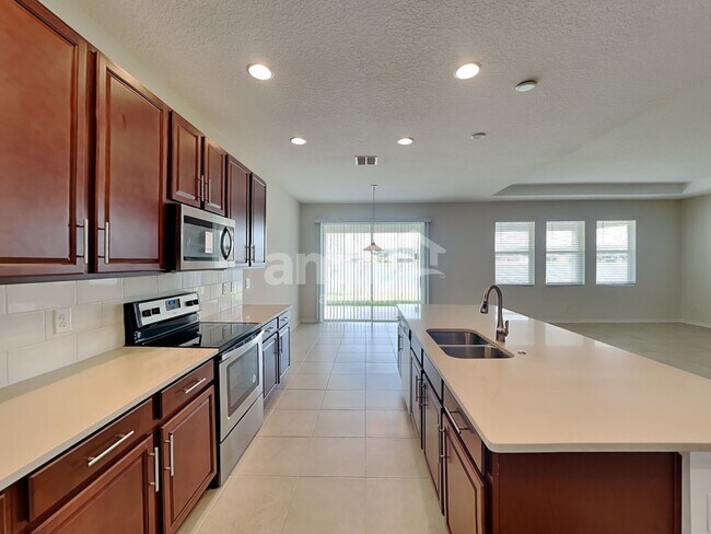 Foto del edificio - 5408 Dove Cottage Lane