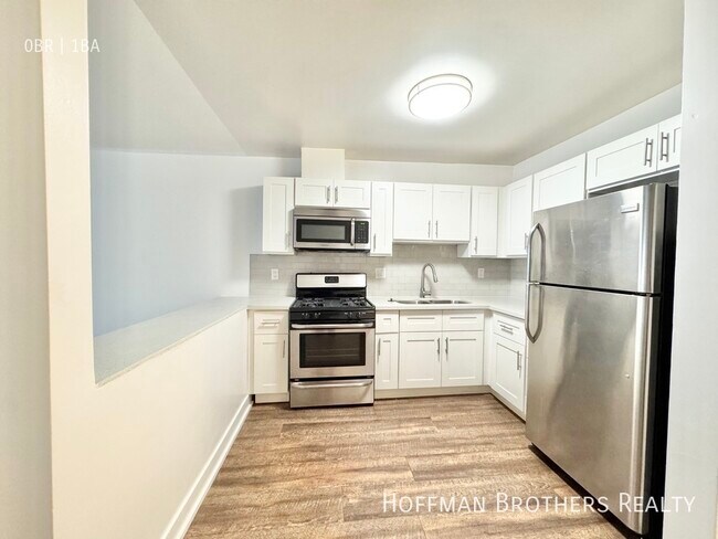 Building Photo - 5128 De Longpre Ave