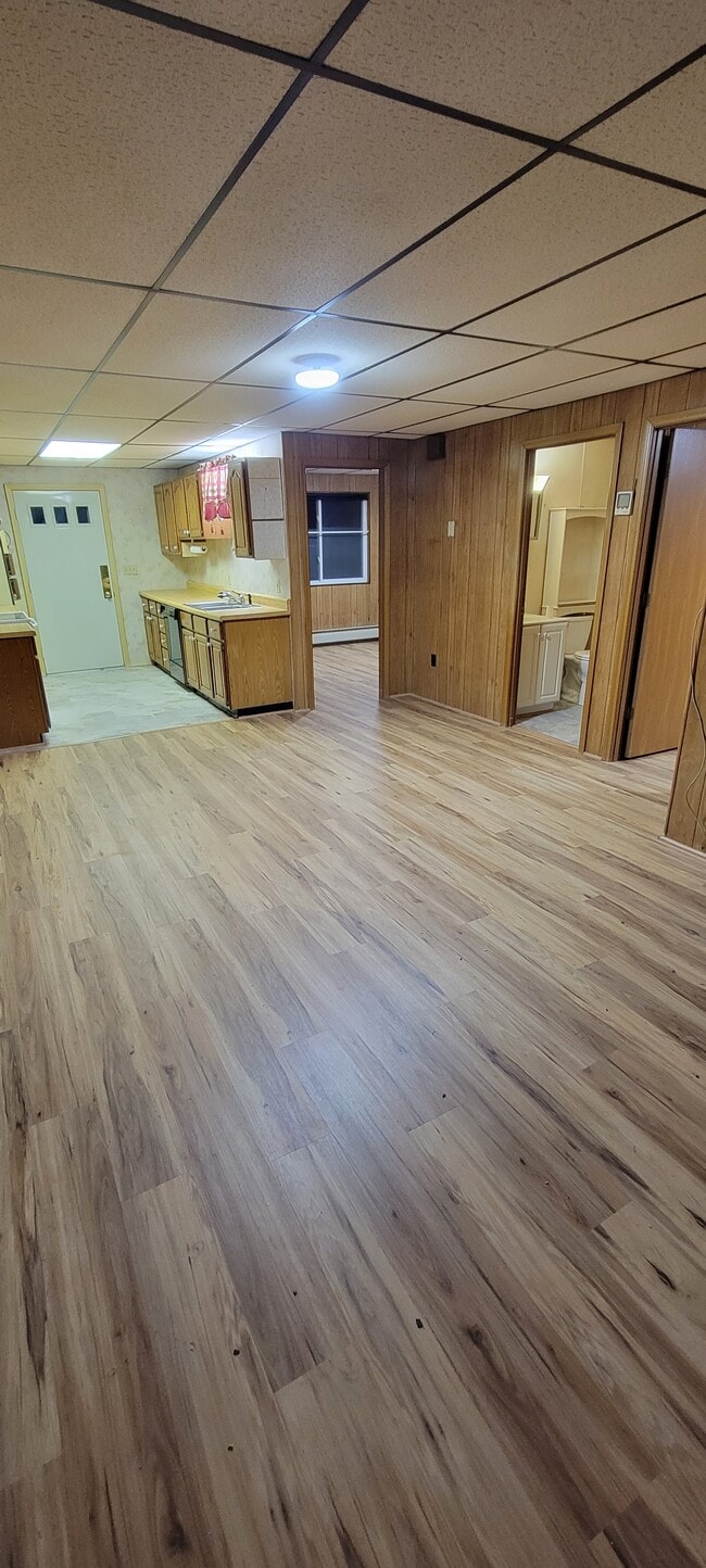 Living room to kitchen - 68 Club Alley Ln