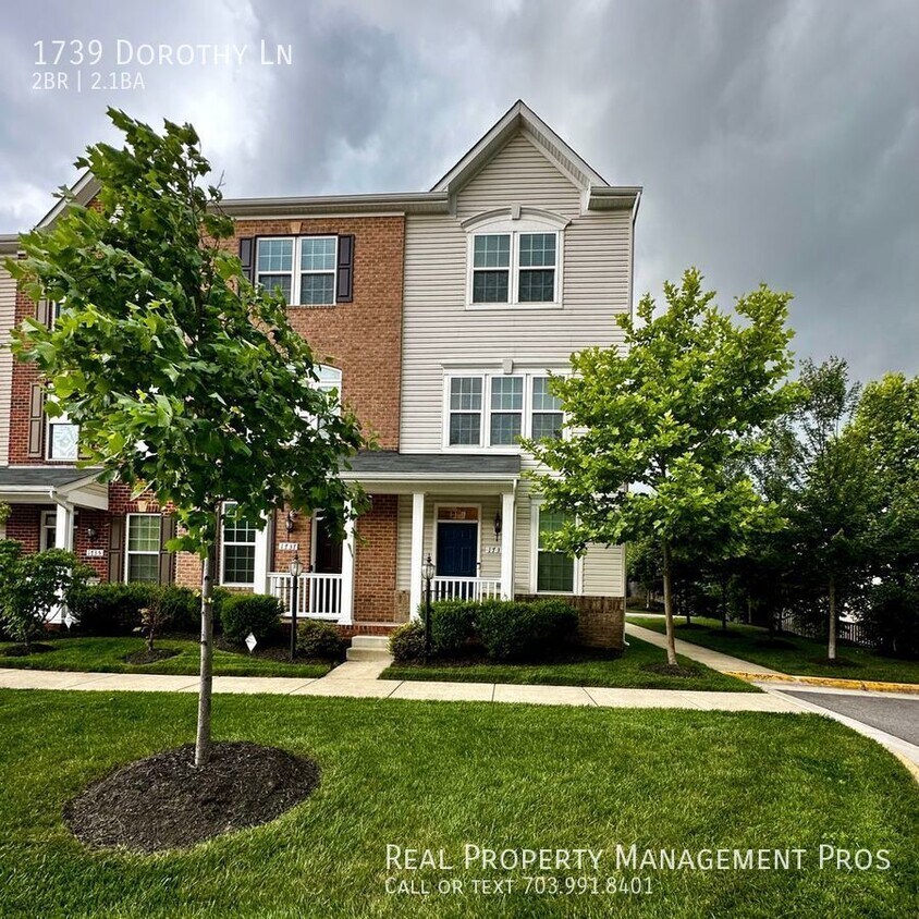 Primary Photo - End Unit Townhome with 1 Car Garage!