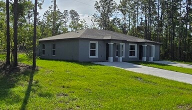 Building Photo - 9400 N Travis Dr