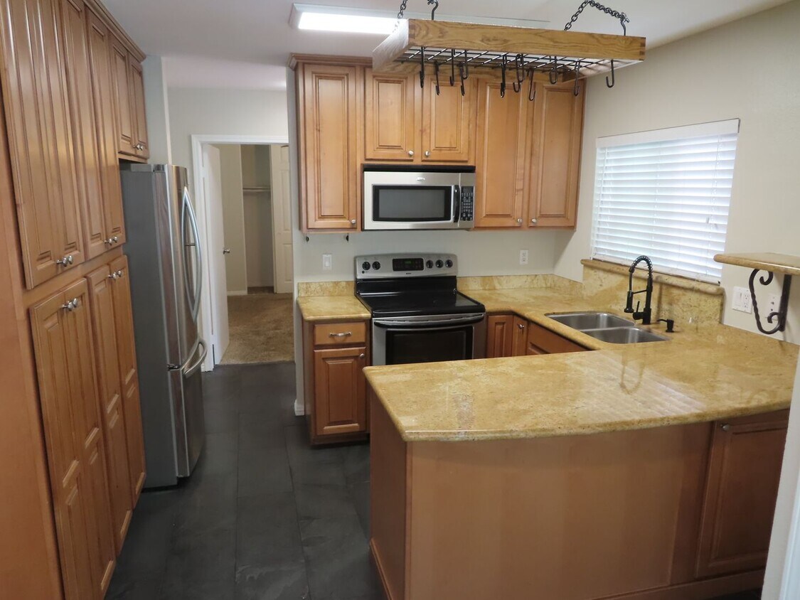 Primary Photo - Nicely Updated Two Bedroom Condo with In-U...