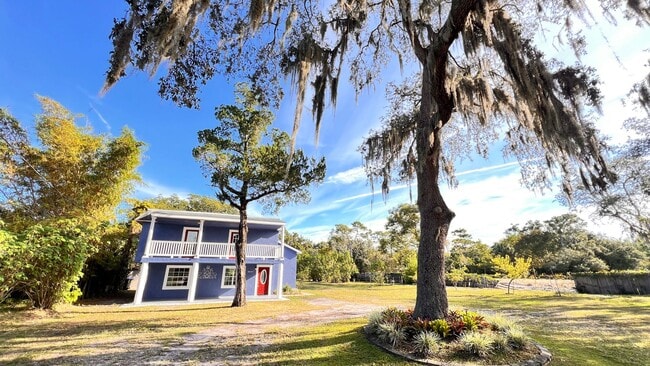 Building Photo - Spacious 4-Bedroom Home in Orlando with La...