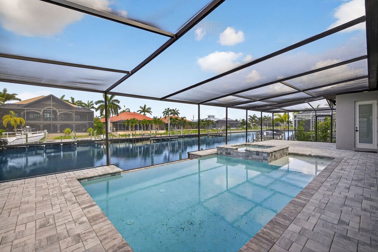 Primary Photo - Direct Gulf Access Pool Home 3 bed +Den 3 ...