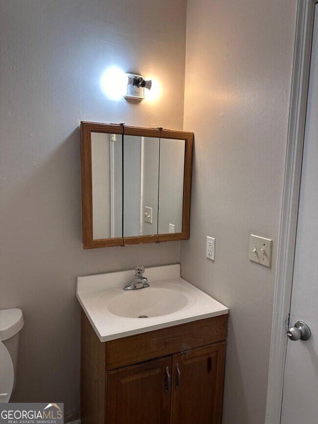 Building Photo - 9249 Woodgreen Way