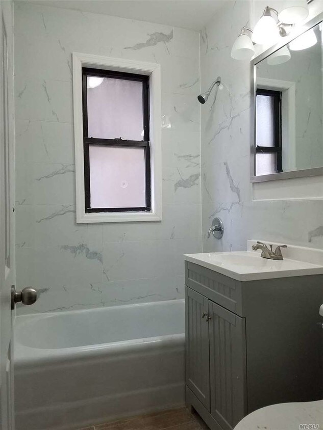 Building Photo - 58-36-58-43 43rd Ave