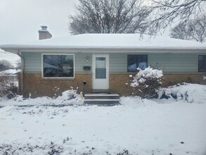 Building Photo - 10525 W Custer Ave