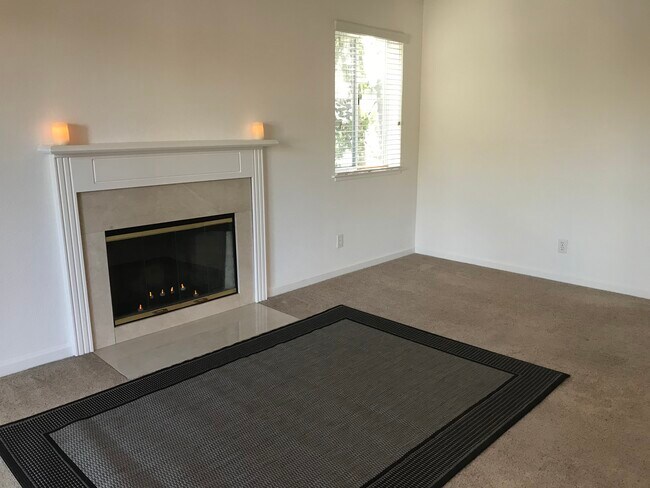 Marble wood burning fireplace - 2968 Moorpark Ave