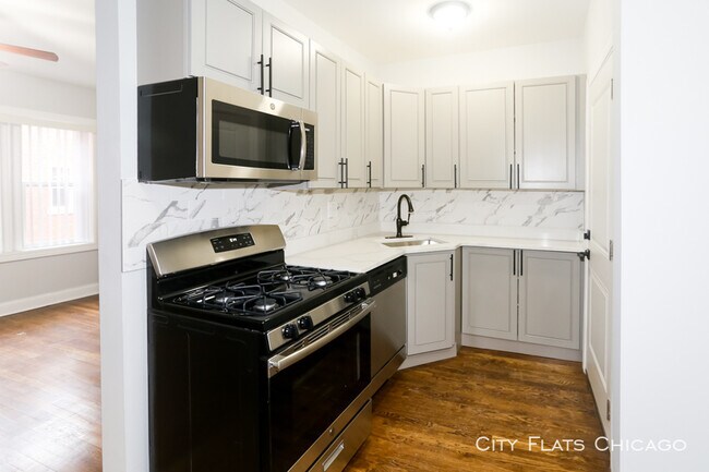 Foto del edificio - 6114 N Winthrop Ave