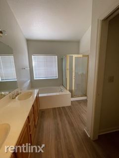Building Photo - 4 br, 3 bath House - 2215 Americana Dr.